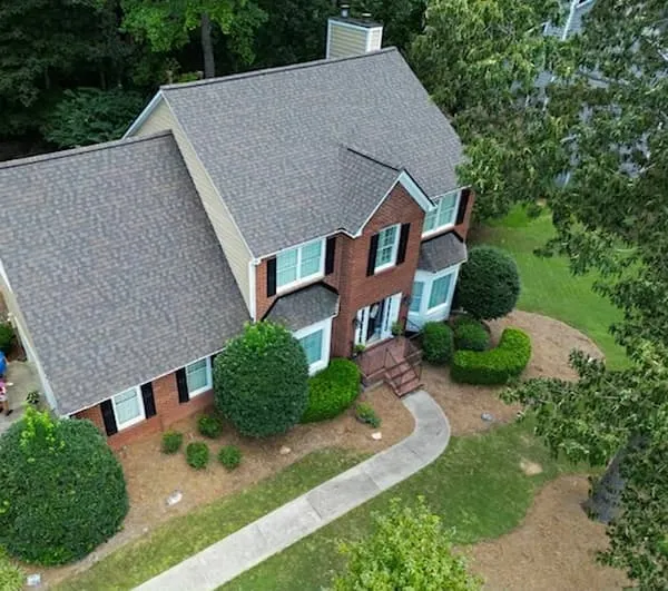 Completed roof repair on a Warminster PA split-level with matched Owens Corning Duration shingles